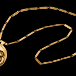 BILL REID (IIJUWAS), O.B.C., R.C.A. (1920-1998), HAIDA, Grizzly Medallion and Chain, 1972 / 1988