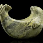 HISTORIC PERIOD INUIT OR POSSIBLY THULE CULTURE MAKERS, Implements and Amulets, c. 19th century or earlier
