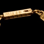 BILL REID (IIJUWAS), O.B.C., R.C.A. (1920-1998), HAIDA, Grizzly Medallion and Chain, 1972 / 1988