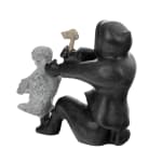 THOMASSIE KASUDLUAK, INUKJUAK (PORT HARRISON), Father Preparing Young Child for Summer Trek, 1987