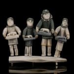 ROMEO EEKERKIK (1923-1983) ARVIAT (ESKIMO POINT), Four Inuit Bringing their Works to the Co-Op, 1975