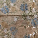 Fragment of embroidery, green, blue and cream taffeta with sprays of flowers