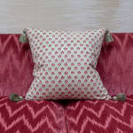 Aleta Fabrics Padma Buti on Green Cushion with Bespoke Tassels