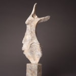 Abstract bronze sculpture of Bone form by sculptor Nicola Godden, displayed on plinth