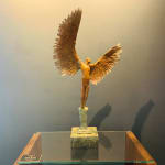 Bronze sculpture of mythical Greek winged figure Icarus by Nicola Godden, displayed on integral plinth