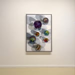 Photorealist painting of colorful marbles