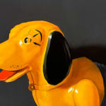 Painting of a toy dog with a hot dog