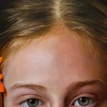 Painting of a girl with flowers in her hair