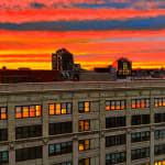 Colorful sunset over Manhattan buildings