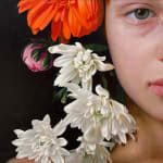 Painting of a girl with flowers in her hair
