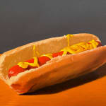 Painting of a toy dog with a hot dog