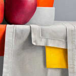 Still life of stacked bowls and two apples