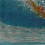 Mixed media resin work of girl in red bikini diving towards floor