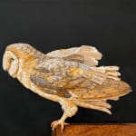 Painting of a brown owl on a ledge