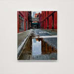 Painting of City Street with Puddle