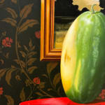 Painting of a watermelon on a red stool