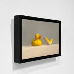 Rubber duck facing plastic minimalist duck