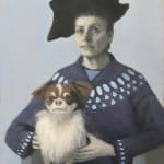 Woman holding dog on lap with two hands