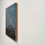 Landscape oil painting of dense woods with blue background on canvas