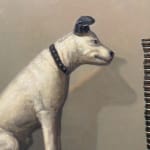 Dog figurine staring at oreo tower