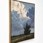 Oil painting of tree with large clouds on canvas