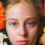 Painting of a girl with flowers in her hair