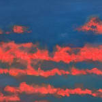 Colorful sunset over Manhattan buildings