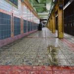 Low hyperrealist view of empty Franklin St. Subway Station