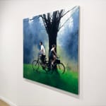 Painting of a man and woman on bikes