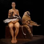 Painting of a woman with bird and monkey