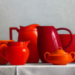 Painting of a still life with red vessels