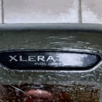 Painting of the artist reflected in a hand dryer