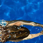 Painting of a woman swimming