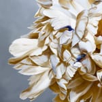Painting of beige flower on gray background