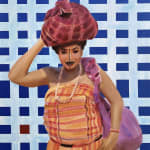 woman with fabric bag onher head