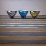 Still life painting of three cups