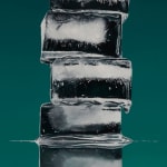 Detail of skinny stack of off center ice cubes before a green and black background