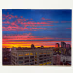 Colorful sunset over Manhattan buildings