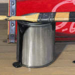 Still life painting of two painted apples on soda boxes