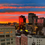 Colorful sunset over Manhattan buildings
