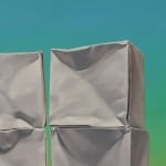 Detail of Wall of 3 columns of 2 origami paper cubes with green and blue background