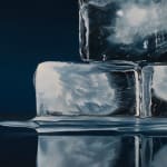 Detail of large ice cubes stacked in a pyramid with blue background