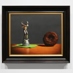 Silver golf trophy on green napkin in swing towards chocolate covered donut