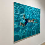 Male figure swimming from above surface on canvas