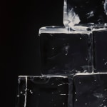 Detail of Dark background with very transparent ice cubes stacked in a pyramid