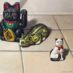 Painting of toy birds and cats