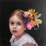Portrait of a little girl with flowers in her hair