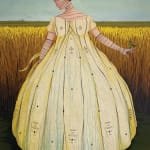 A woman standing in a wheat field