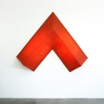 red arrow wall lamp mounted on a white wall
