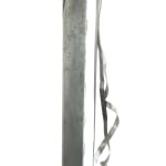 metal sculpture of an exaggerated woman's high heel